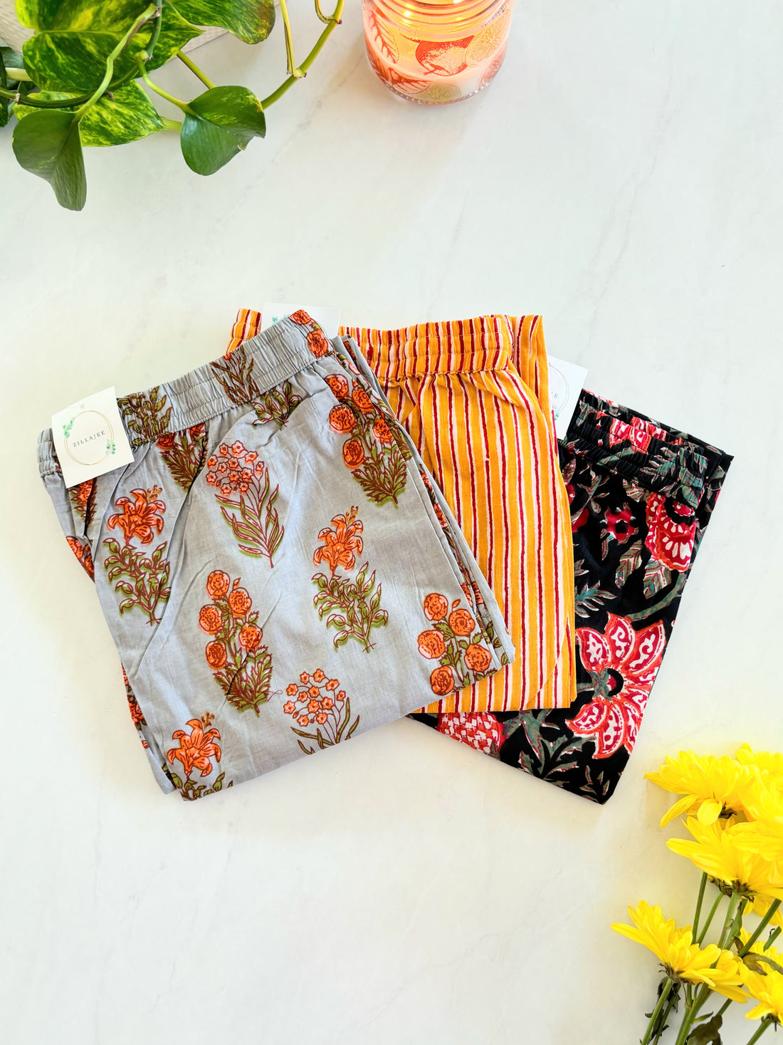 Soft and breathable cotton pajama pants for women with vibrant floral print and deep pockets, perfect for sleep or lounging