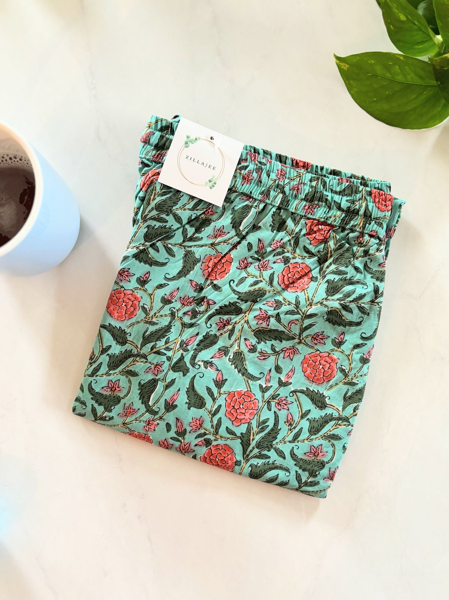 Soft cotton lounge pants with a cooling floral print, perfect for sleepwear or a comfortable day at home.