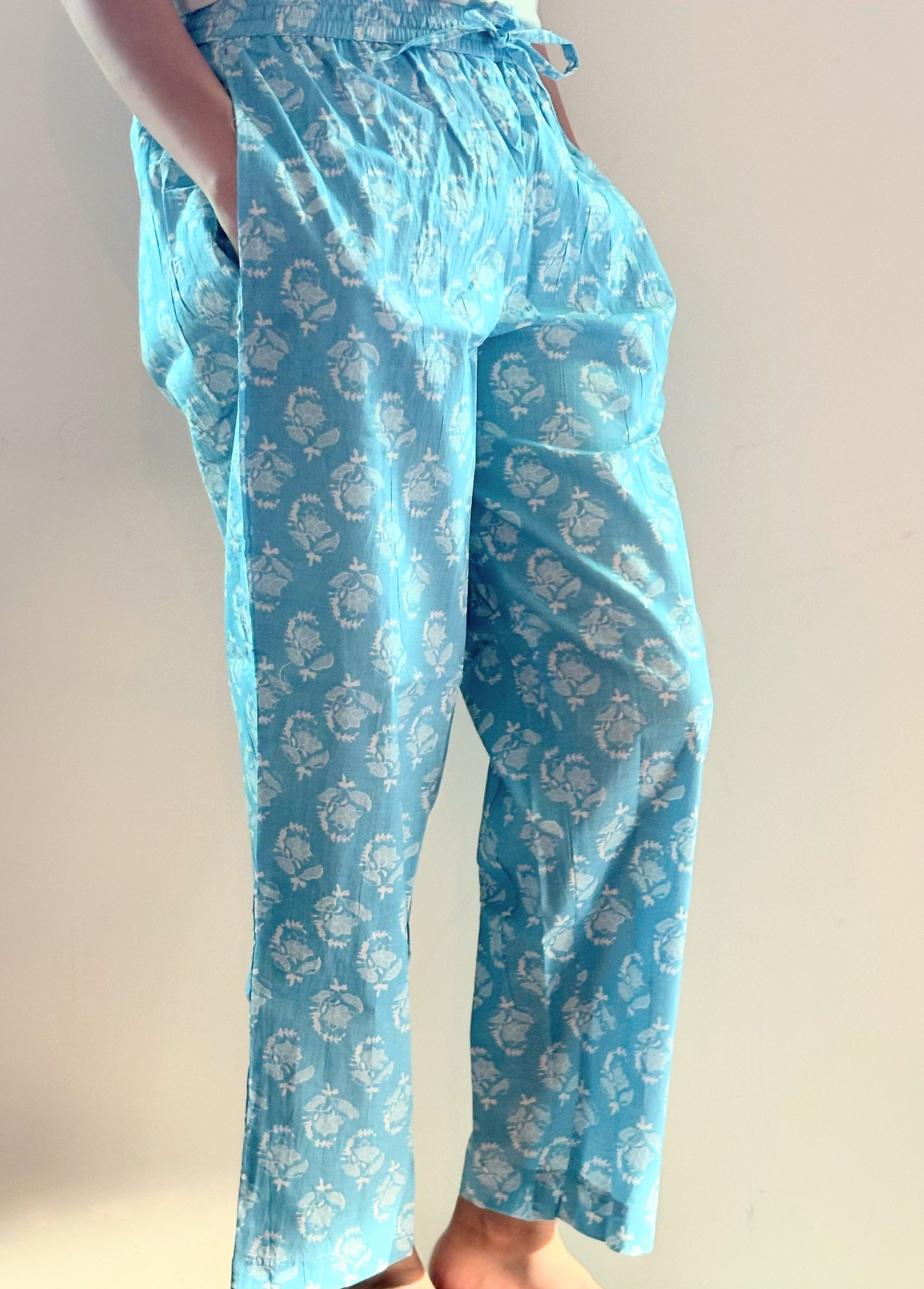 SEO Description: Elevate your sleepwear with these 100% organic cotton pajama pants featuring an elastic waistband, deep pockets, and a delicate winter-inspired pattern. Available in petite, short, tall, and plus sizes. Ideal for new moms, girls' trips, sleepovers, and more. Experience the natural benefits of organic cotton that keeps you comfortable in all seasons. Shop now for eco-friendly sleepwear with no shrinkage or stretch.