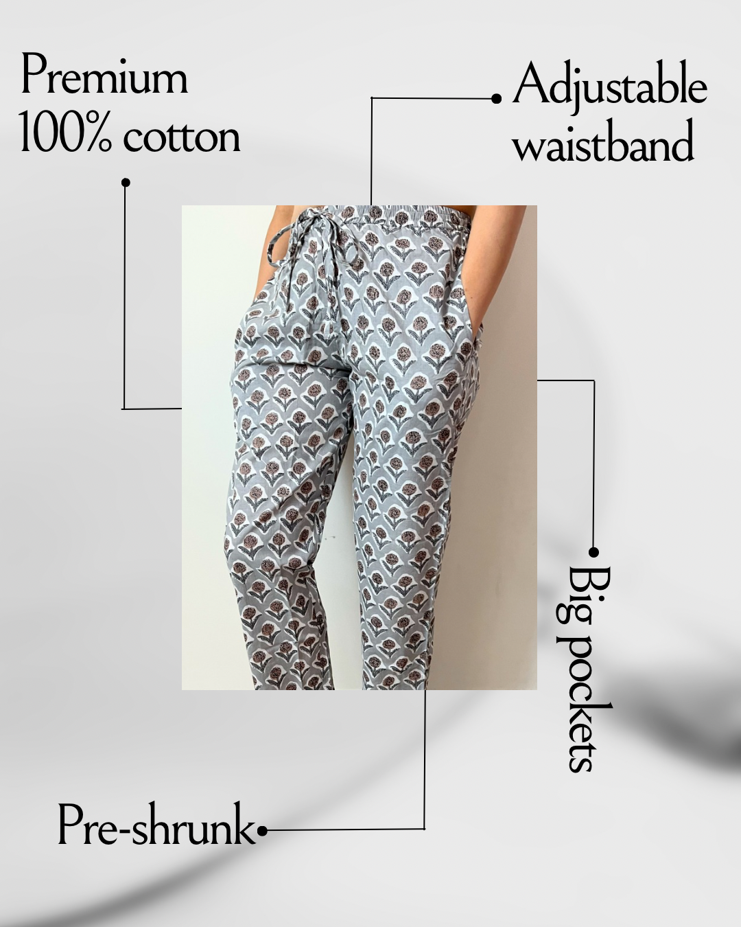 Comfy and breathable 100% cotton pajama pants for women, adorned with a floral pattern of brown and gray flowers on a gray backdrop, complete with handy pockets.