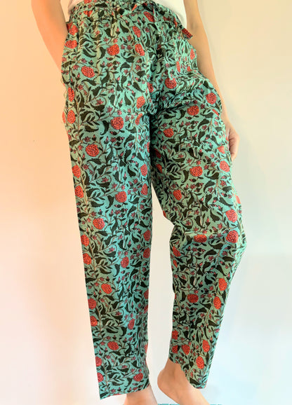 Vibrant floral print lounge & sleep pants with an elastic waistband and pockets, ideal for a modern, relaxed look.