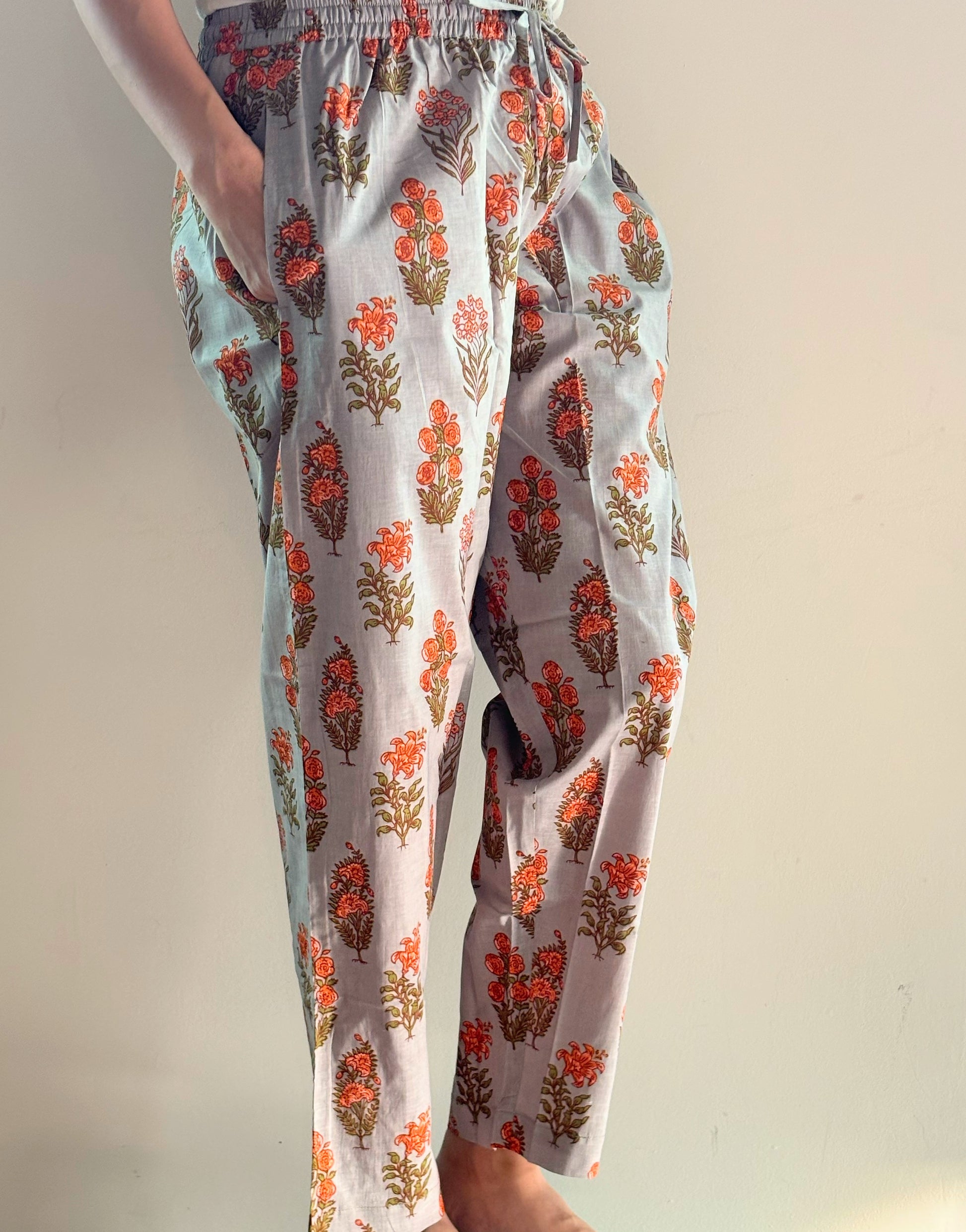 100% cotton lounge & sleepwear for women, featuring a vibrant orange floral design on gray, perfect for comfy days lounging around or as a bridesmaid gift idea.